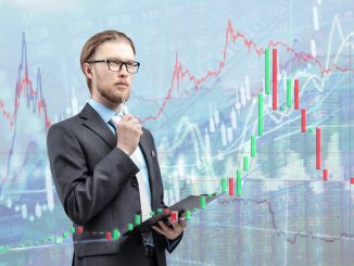 businessman trader analyst in glasses spectacles with notebook and thinking, on diagram background. Trading on stock exchange concept